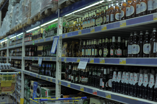 Russia, St. Petersburg 25,01,20144 Bottles with beer on supermarket shelves