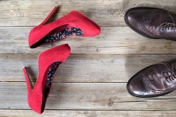 red shoes on wooden background