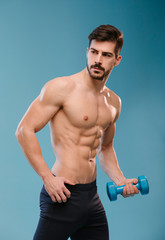 Fototapeta na wymiar Handsome Athletic Man Fitness Model