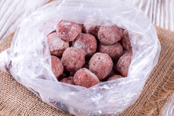 Frozen meatballs in plastic bag