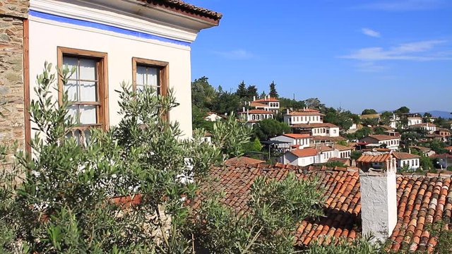 Sirince village famous for its tradition and hospitality. Cottages built on two levels, ground floor houses the kitchen, bedrooms and living room are upstairs. Frames and wooden shutters dress the lar
