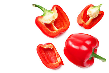 red sweet bell pepper with slices isolated on white background. top view