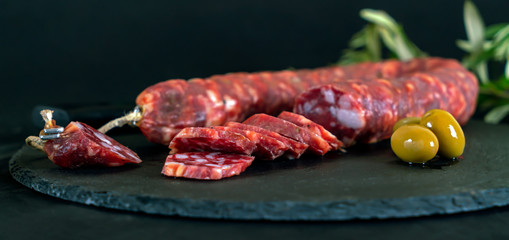 traditional italian sausages with olives