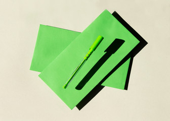Colorful correspondence envelopes. Geometric Minimalist composition with shadow. Send letter. Flat lay.