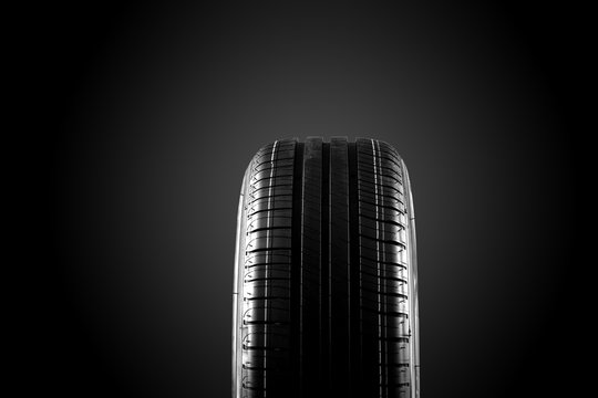 Tire Isolated On Black Background. Summer Car Tire