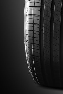 tire isolated on black background. Summer car tire