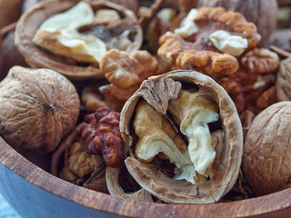 Walnuts lie on a light colored background