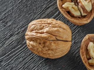 Walnuts lie on a light colored background
