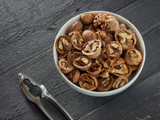 Walnuts lie on a light colored background