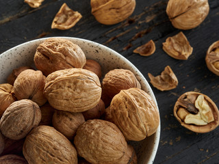Walnuts lie on a light colored background