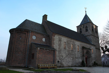 Fototapeta premium The Old Church in the Dutch village Oosterbeek on a evening in April