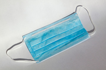 Isolated blue medical mask for virus protection