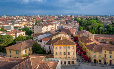 Obraz premium Red roofs of Pisa old town. Pisa tower viewpoint. Toscana province, Italy.