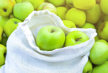 Soft focus photo. Reusable shopping bag with fruit. Zero waste. Ecologically and environmentally friendly packets. Canvas and linen fabrics. Save nature concept. No plastic single use in supermarkets.