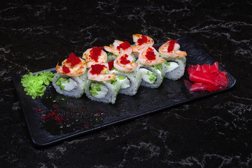 sushi with fish shrimps and so on.sushi on a black background