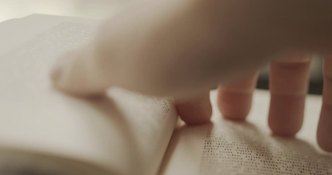 Leafing through a book