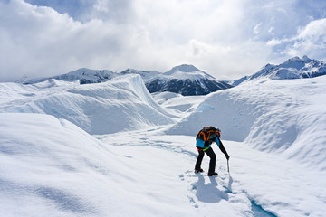 Fototapeta na wymiar Big Ice trekking guide planning route on Perito Moreno glacier