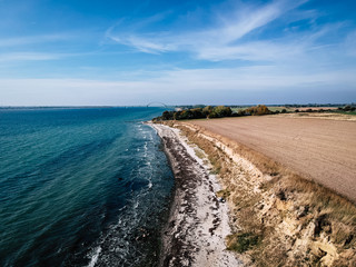 drone shot of the cliffs in wulfen on fehmarn germany