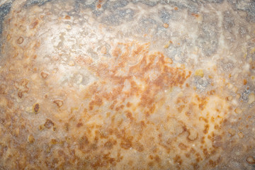 stone background with random brown and abstract shapes