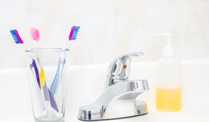 Dental hygiene. Tooth brushes in glass