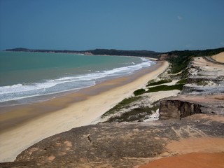 Sunny day in terrestrial paradise with sea, sand, mountain, trees, birds, stones, rocks, boats, fish and happy people