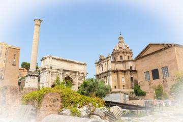  triumphal arch of Septimius Severus (Arco di Settimio Severo) and the Santi Luca e Martina church in the Roman Forum, Rome, Lazio, Italy