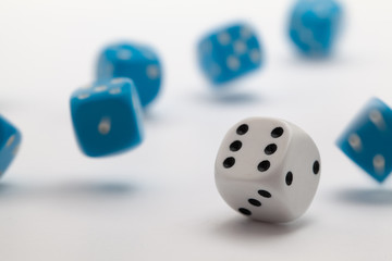 Blue and White playing dice at white  background.