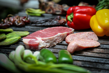 raw meat and vegetables