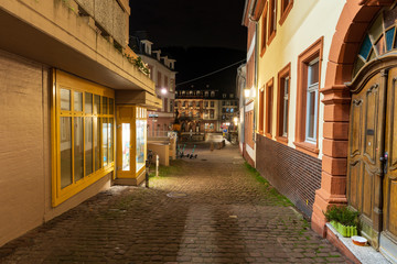 19.03.2020: Heidelberg Old Town with pubs, restaurants and historic buildings shortly after sunset