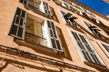 Obraz premium Houses with large windows in Bastia, Corsica