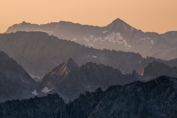 alpine mountains profiles at sunrise, Adamello Park, Lombardy, Italy