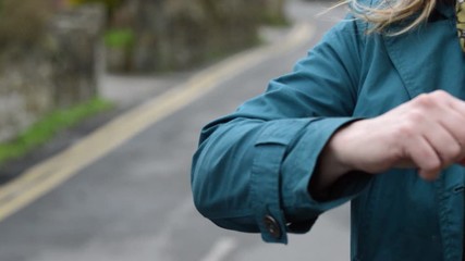 Elbow bump greeting to avoid the spread of coronavirus. Two friends meet, instead of greeting with a hug or handshake, they stay apart and tap elbows together.