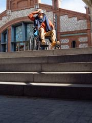THE WHEELCHAIR AND THE STAIRS