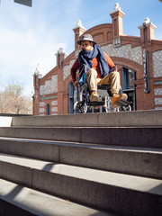 THE WHEELCHAIR AND THE STAIRS