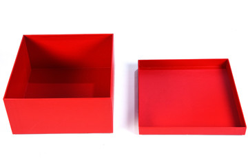 beautiful red gift box with open lid with side view and space for text on white background