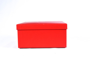 beautiful red gift box with closed lid with side view and space for text on white background