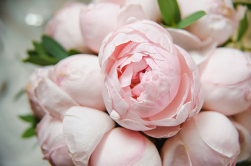 Fresh, lush bouquet of pink peony flowers for present . Wedding bouquet, close-up photo, macro