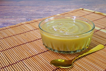Traditional Thai custard is a common dipping sauce for fresh breads of all sorts. Selctive focus, space for texts