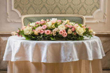 Colorful wedding bouquet on a table. Bridal bouquet. Luxury royal hotel. Valentine's day, birthday, dating or mother's day decoration