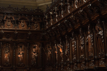 Figures wood in the chorus of Malaga Cathedral of Encarnacion, Malaga, Spain