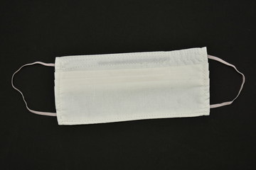 Fototapeta premium Homemade White Cotton Face Mask ,Coronavirus mask ,COVID-19