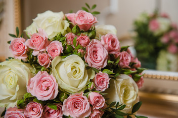 Colorful wedding bouquet on a mirror. Bridal bouquet. Luxury hotel room. Valentine's day or mother's day present