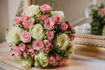 Colorful wedding bouquet on a mirror. Bridal bouquet. Luxury hotel room. Valentine's day or mother's day present
