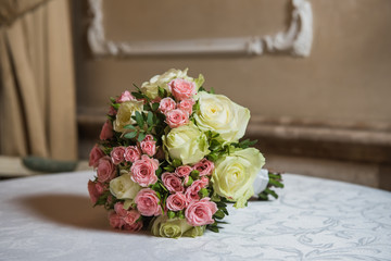 Colorful wedding bouquet on a table. Bridal bouquet. Luxury royal hotel. Valentine's day, birthday, dating or mother's day decoration