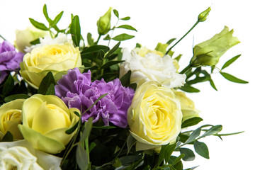 Fresh, lush bouquet of colorful flowers for present isolated on white background. Wedding bouquet of yellow roses and freesia flowers