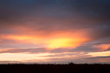 Fototapeta na wymiar Beautiful sunset sky with green glass