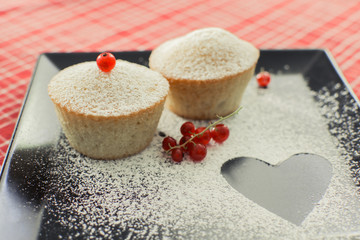 Cupcakes on a plate. Sweet cupcake with heart for Valentine's Day.