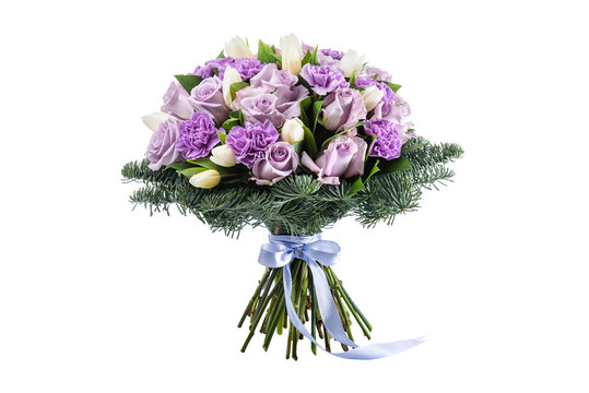 Fresh, lush bouquet of colorful flowers for present isolated on white background. Wedding winter bouquet of purple and white roses and freesia flowers. Christmas bouquet