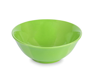 Green ceramic bowl on white background.