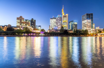 Fototapeta na wymiar Modern skyline of Frankfurt, Germany. City river and buildings at night